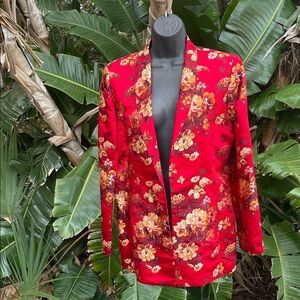 Red brocade silk blend jacket by Flores and Flores